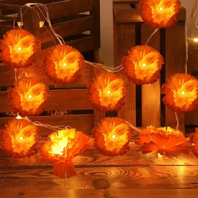 Künstliche LED-Ringelblumen-Girlande mit Lichterkette