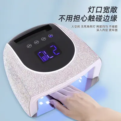 Neue diamantbeschichtete Maniküre-Lichtherapiemaschine mit kabellosem Laden und Aufbewahrung tragbare Maniküre-Lichtherapiemaschine Backofen-Lampe Trockner