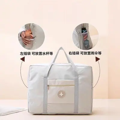 圆标飞机旅行收纳包加厚大容量衣服手提收纳袋旅游行李箱整理袋厂