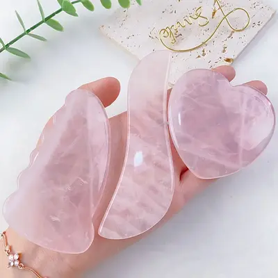 Amazon grenzüberschreitend meistverkaufte wertvolle Stein-Kratztabletten natürlicher rosa Kristall Herzform Horn Beruhigung und Beauty-Massage aktiviert