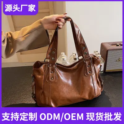 European and American retro solid color PU large capacity bag, cross-border commuting women's handbag, factory bulk supply, can be labeled and shipped on behalf of others.