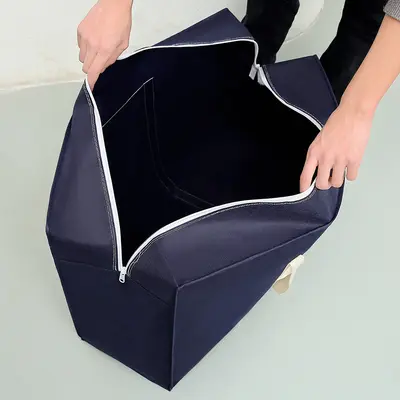Portable non-woven durable moving bag, waterproof luggage bag, large capacity clothing and quilt storage bag wholesale