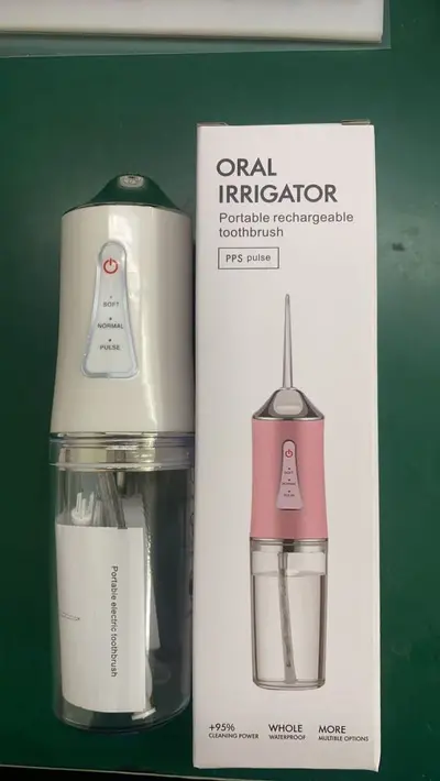 Portable electric oral irrigator with intelligent pulse technology