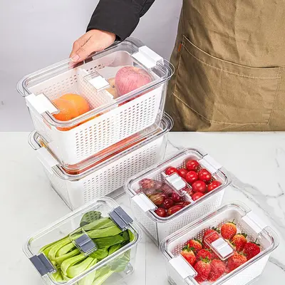 Kitchen refrigerator storage container with dividers and drain