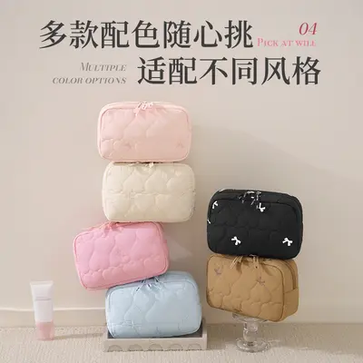 Portable makeup bag with butterfly bow design