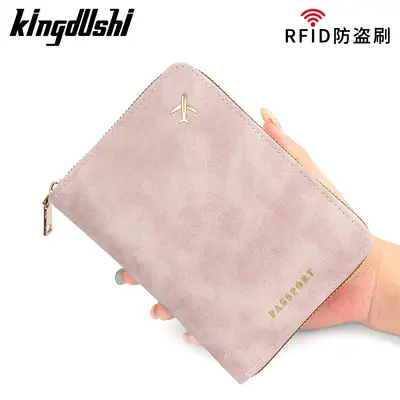 RFID-blocking passport holder with zipper and card storage