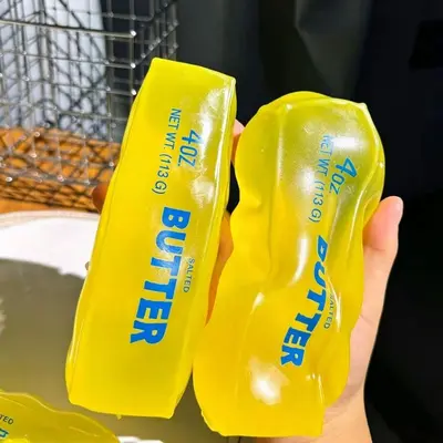 Formbares Quetschspielzeug in Butterstick-Form, langsame Rückstellung, Stressabbau