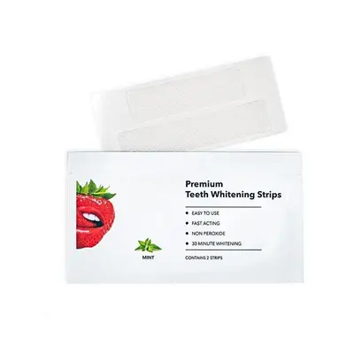 Strawberry-flavored teeth whitening strips removing stains and yellowing