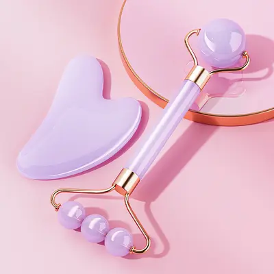 Rosen-Quarz doppelseitiger Walzen-Gesichtsmassagegerät Jade Gesichtslift Schönheits-Gua-Sha-Tool Augenmassageroller Hals- und Wirbelsäulenmassagegerät