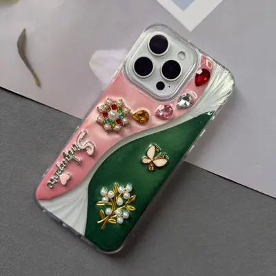 iPhone 17 Pro Max case with pearl necklace and butterfly details