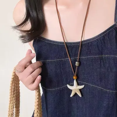 Round ring pendant necklace, black cord, long chain style
