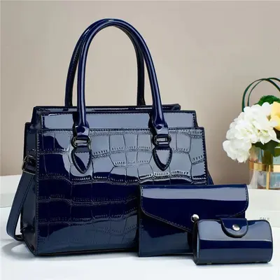 Große Damen-Handtaschen im 3er-Set mit Prägung und Riemen - 8