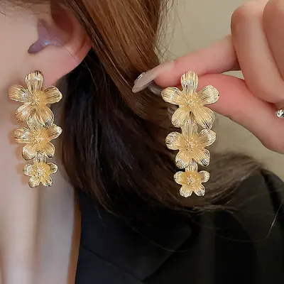 Gümüş iğne Avrupa ve Amerika sınır ötesi çiçek geometrik püskül küpeler moda metal tarzı küpeler hafif lüks üst düzey küpeler toptan - 9