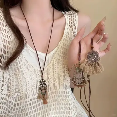Round ring pendant necklace, black cord, long chain style
