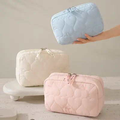 Portable makeup bag with butterfly bow design
