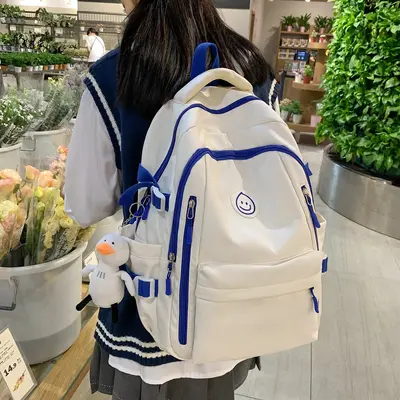 Grenzüberschreitender Rucksack koreanischer Stil Instagram-Stil vielseitiger Universitäts-Schülertasche Damen japanischer Stil Nylon-Mittelschüler-Rucksack großer Kapazität