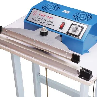Foot-operated sealing machine shrink film cutting