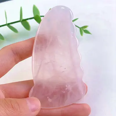 Amazon grenzüberschreitend meistverkaufte wertvolle Stein-Kratztabletten natürlicher rosa Kristall Herzform Horn Beruhigung und Beauty-Massage aktiviert