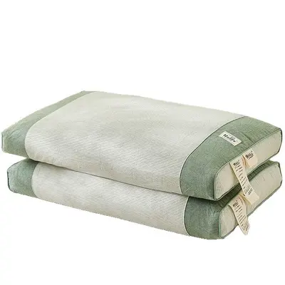 Cotton buckwheat hull pillow with cervical spine support