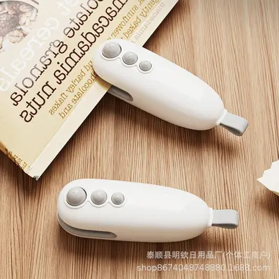 Mini hand-operated portable sealing machine for plastic bags