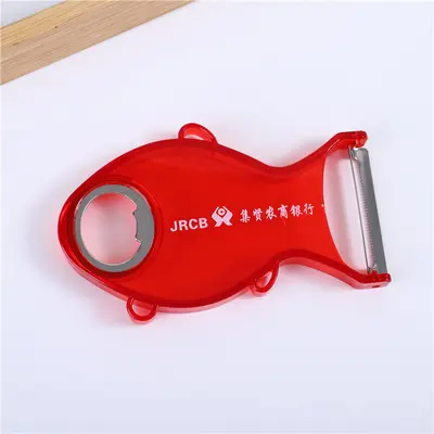 Fish-shaped stainless steel fruit peeler, transparent