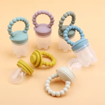 Baby fruit food supplement, baby pacifier, teether, food-grade silicone fruit and vegetable chewing toy, wholesale product for babies and children.