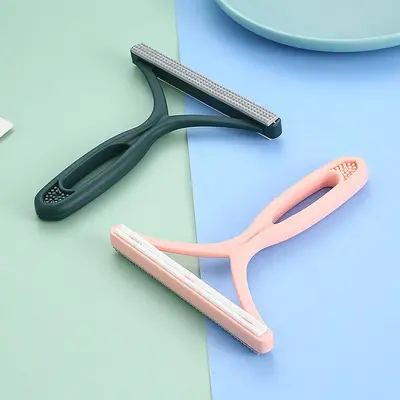 Manual lint remover for pet hair and clothing