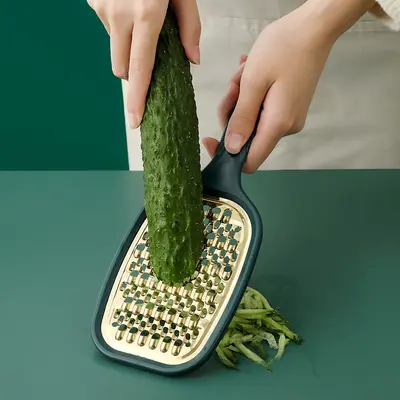 Edelstahl multifunktionale Kartoffelreibe für Zuhause Küche Knoblauch Rettich Gemüse Hobel Reibe Obst- und Gemüseschneider - 2