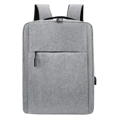 Business backpack with USB charging and laptop compartment