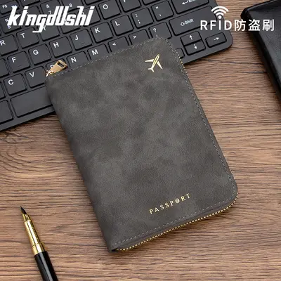 RFID-blocking passport holder with zipper and card storage