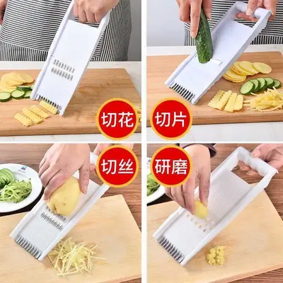 Çiçekleri kalın ve ince parçalara, patates ve salatalık rendesine, turp rendesine ve sebze doğrayıcıya kesmek için mutfak parçalayıcı. - 7