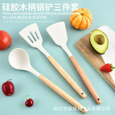 Beyaz Silikon Ahşap Saplı Mutfak Eşyaları Seti Gıda Seviyesi Yüksek Sıcaklık Dayanıklı İzolasyonlu Spatula Kepçe Çorba Kaşığı Yemek Maşası Saklama Kovası