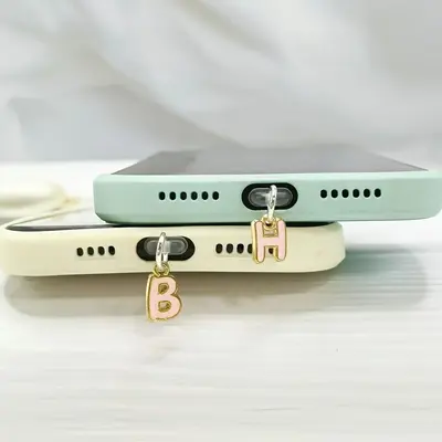 Cep telefonu toz fişi alaşım pembe mektup çekicilik toz fişi evrensel cep telefonu tozluk aksesuarları metal malzeme