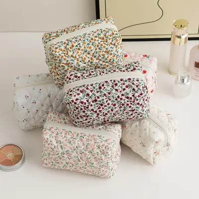 Floral quilted cosmetic bag, portable for travel