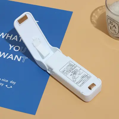 Mini yapıştırma makinesi, küçük ev tipi plastik yapıştırma makinesi, aperatif yapıştırma artefaktı, taşınabilir nem geçirmez elle preslenmiş plastik torba yapıştırma makinesi