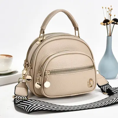 Women's Small Round Crossbody Bag, Multi-Layer Phone Bag - 9
