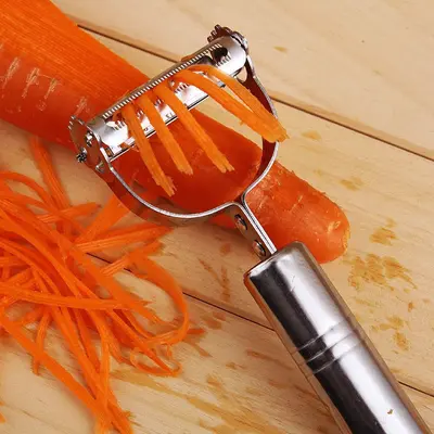 Stainless steel multi-functional vegetable peeler