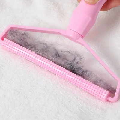 Manual fabric shaver, plastic handle, double-sided - 3