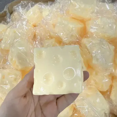 Oversized Cheese-Shaped Squeeze Stress Toy Filled with Petroleum Jelly and Coconut Oil - 12