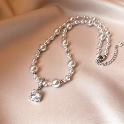 Titanium steel pearl necklace, rose design, non-fading, lightweight luxury