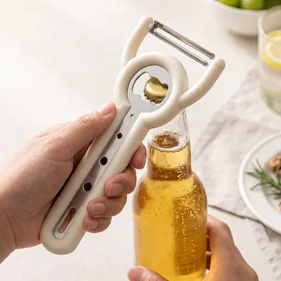 Multi-function fruit peeler and bottle opener - 3