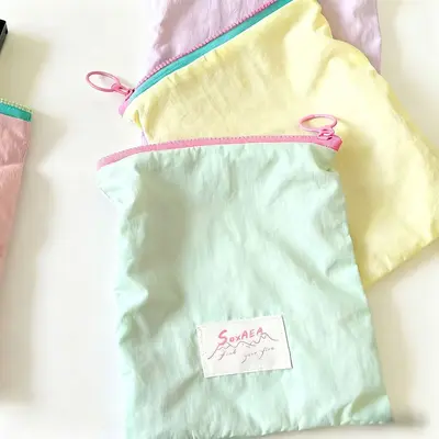 Tragbare Kosmetiktasche, schlank, Makkaron-Farben, Reißverschluss - 9