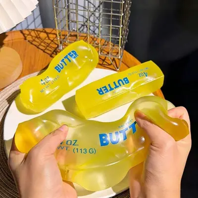 Formbares Quetschspielzeug in Butterstick-Form, langsame Rückstellung, Stressabbau