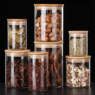 Hersteller Großhandel mit hohem Borosilikatglas, versiegeltes Glas, Aufbewahrungsflasche, Süßigkeiten-Aufbewahrungsglas, gerades Rohr, Teeglas, Bambusdeckel, Teeglas