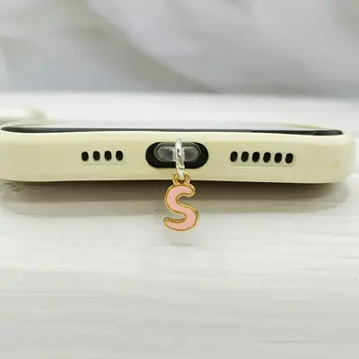 Cep telefonu toz fişi alaşım pembe mektup çekicilik toz fişi evrensel cep telefonu tozluk aksesuarları metal malzeme
