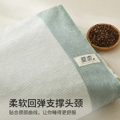 Cotton buckwheat hull pillow with cervical spine support