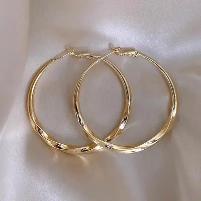 Large flat ring earrings - 11