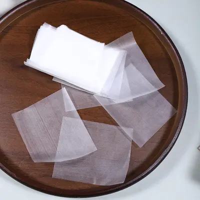 Edible glutinous rice paper in stock for baking, nougat wrapping paper, candied hawthorn sugar coating paper, suitable for medical packaging purposes.