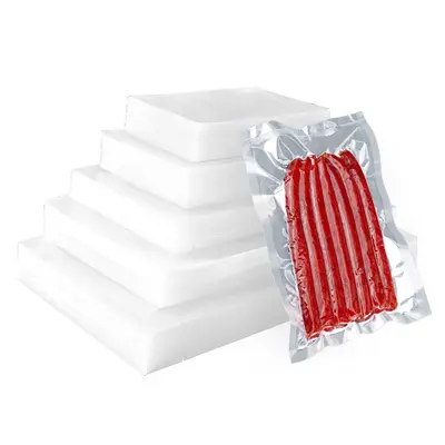 Polyester-Vakuumiereutel mit Pünktchenmuster zum Großhandel transparente Vakuumverpackungsbeutel versiegelte Vakuumkompressions-Schutzbeutel bedruckbar
