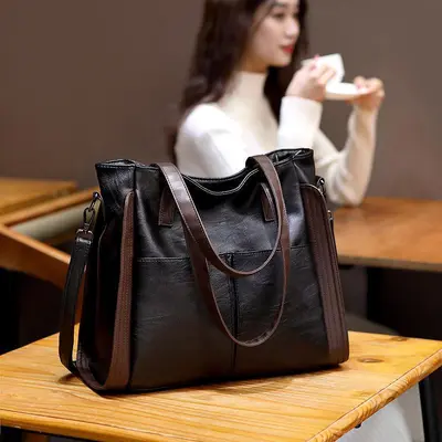 Grenzüberschreitende Damenhandtasche in modischem Design aus Europa und Amerika, großes Fassungsvermögen, neues Modell Frühjahr/Sommer 2026, trendige lässige Handtasche, Umhängetasche und Schultertasche